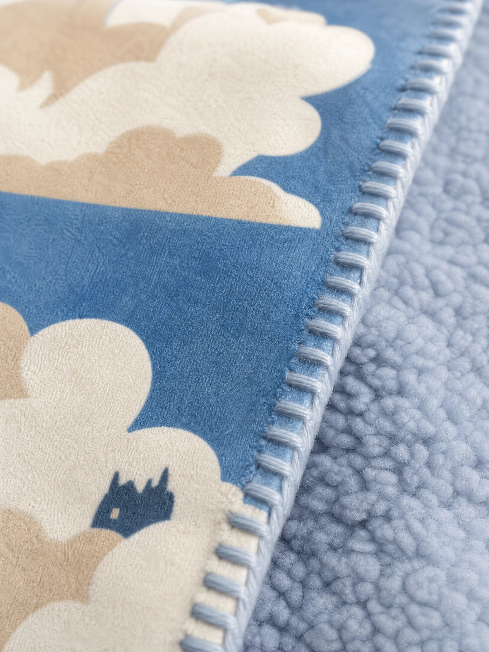 The Cloud City | Sherpa Throw · Blue